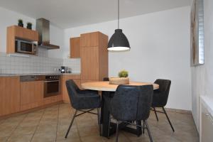 Kuchyňa alebo kuchynka v ubytovaní Yako Apartment - Wagrain Center