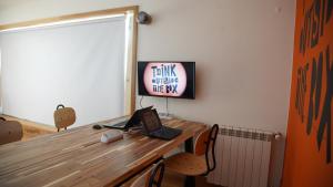 Una televisión o centro de entretenimiento en Sea Soul Esposende