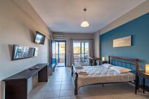 Postel nebo postele na pokoji v ubytování Philyra appartments