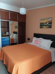 Säng eller sängar i ett rum på Casa Da Praia "AL"