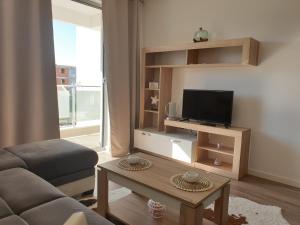 A television and/or entertainment centre at Apart sunset