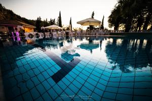 Kolam renang di atau dekat dengan Hotel Pomara