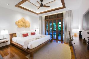 מיטה או מיטות בחדר ב-Prangpaya Khaoyai