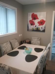 a dining room with a table with a bowl on it at Best view on Westview in Hanmer Springs