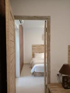 Tirtha Khayangan客房内的一张或多张床位