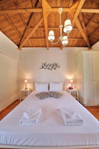 A bed or beds in a room at Katerina