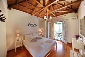 A bed or beds in a room at Katerina