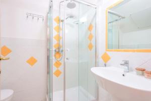 a bathroom with a shower and a sink at Casa Nostra in Pula +26 photos