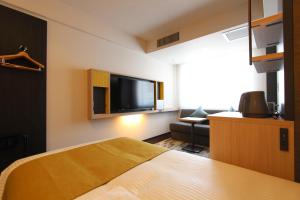 TV a/nebo společenská místnost v ubytování KOKO HOTEL Tsukiji Ginza