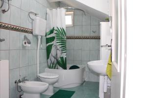 Koupelna v ubytování Apartment Teraferma 2