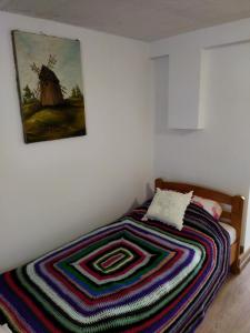Ένα ή περισσότερα κρεβάτια σε δωμάτιο στο Rustykalny Apartament