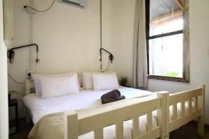 Кровать или кровати в номере CURIOCITY Backpackers Johannesburg