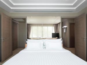 Postel nebo postele na pokoji v ubytování PP Princess Resort