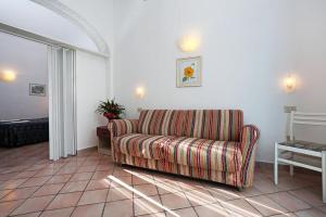 Uma área de estar em Hotel Residence S.Angelo