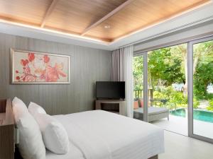 Postel nebo postele na pokoji v ubytování PP Princess Resort