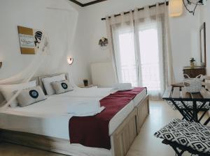 Postel nebo postele na pokoji v ubytování Hotel Alexandra