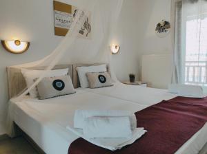 Postel nebo postele na pokoji v ubytování Hotel Alexandra
