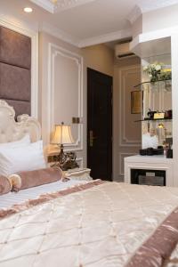 Voodi või voodid majutusasutuse Royal Holiday Hanoi Hotel toas