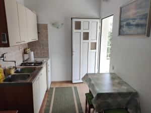 Kuchyň nebo kuchyňský kout v ubytování Apartments Vodice Srima