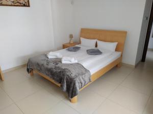 Posteľ alebo postele v izbe v ubytovaní LIDO Apartamenty