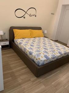 Postel nebo postele na pokoji v ubytování B&B Piano Romano -con parcheggio privato gratuito-