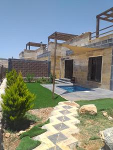 Foto dalla galleria di Dar Gerasa chalets The THREE Palm a Jerash