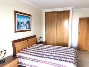Uma cama ou camas num quarto em Varandas do Sol