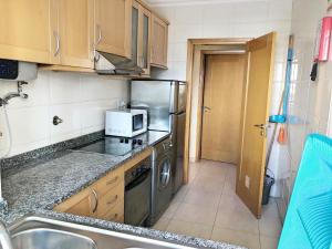 A cozinha ou kitchenette de Varandas do Sol