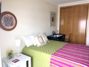 Uma cama ou camas num quarto em Varandas do Sol
