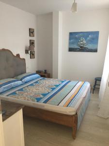 Postel nebo postele na pokoji v ubytování VILLA IL BLU direkt am Meer
