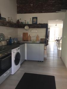 Kuchyň nebo kuchyňský kout v ubytování VILLA IL BLU direkt am Meer