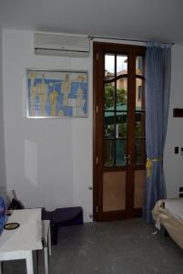 Postel nebo postele na pokoji v ubytování Perla B&b
