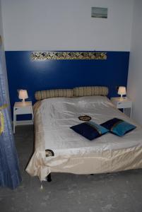 Postel nebo postele na pokoji v ubytování Perla B&b