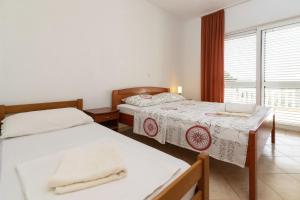 Postel nebo postele na pokoji v ubytování B&B Maris Srima