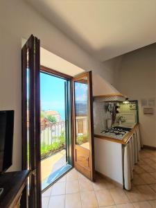 Kuchyň nebo kuchyňský kout v ubytování La Casa Dei Venti