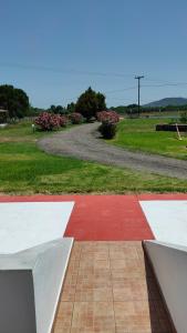 a skateboard park with a red and white floor at Vigla House in Sykia Chalkidikis