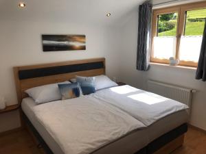 Postel nebo postele na pokoji v ubytování Haus Fernsebner