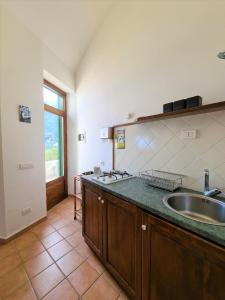 Kuchyň nebo kuchyňský kout v ubytování La Casa Dei Venti