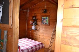 Postel nebo postele na pokoji v ubytování Intry Etna Chalet