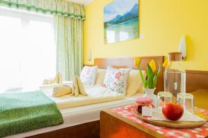 Ένα ή περισσότερα κρεβάτια σε δωμάτιο στο Hotel garni Weberhäusl