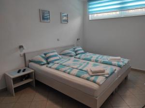Posteľ alebo postele v izbe v ubytovaní Ferienwohnung Marina