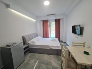 TV a/nebo společenská místnost v ubytování Rest Hour Hotel