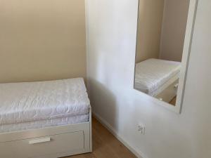 Posteľ alebo postele v izbe v ubytovaní Apartament - U Wujka