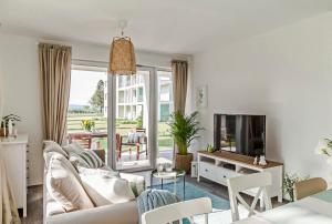 Televisyen dan/atau pusat hiburan di Blue Apartments