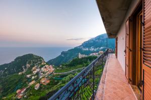 a balcony with a view of the mountains at CASA BELLAVISTA Scala Minuta Amalfi Coast in Scala