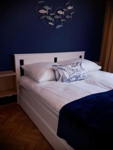 Posteľ alebo postele v izbe v ubytovaní Apartament KATE