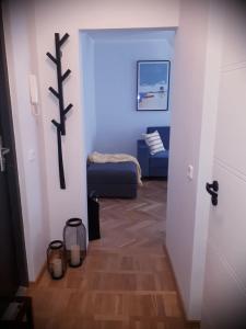 Posteľ alebo postele v izbe v ubytovaní Apartament KATE