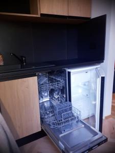 Kuchyňa alebo kuchynka v ubytovaní Apartament KATE + 23 fotografií