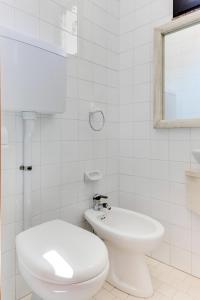 Koupelna v ubytování Hotel Sorriso