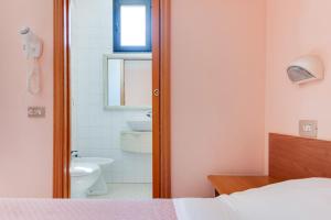 Koupelna v ubytování Hotel Sorriso